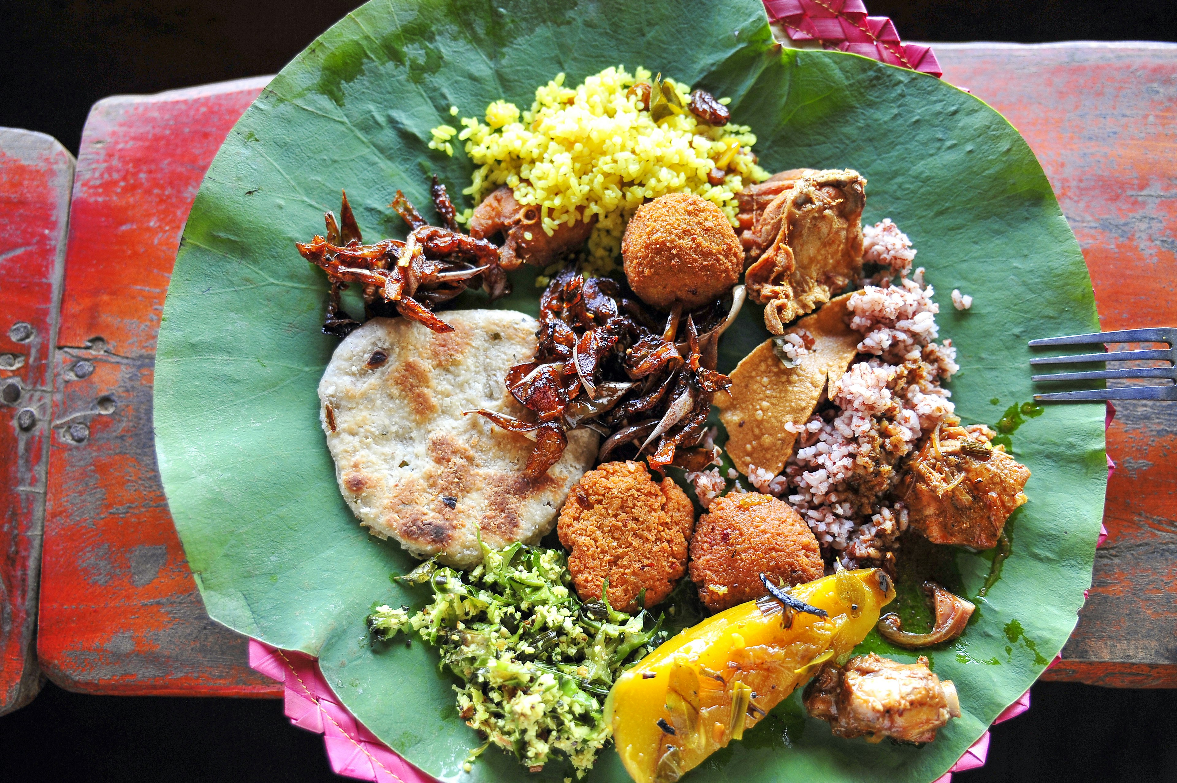 Traditional vegetarian food from Sri Lanka served on a leaf