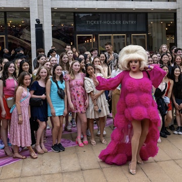NEW YORK, NEW YORK - JULY 08: Lady Bunny (C) jumps into a photo with students from the Ellison Ballet program outside of The Wedding: New York's Biggest Day at David Geffen Hall at Lincoln Center on July 08, 2023 in New York City. Lincoln Center’s Summer for the City event brought hundreds of couples together for an interfaith ceremony for those getting married for the first time, renewing vows or simply celebrating their love for the city. Due to inclement weather the event was moved indoors. (Photo by Alexi Rosenfeld/Getty Images).NEW YORK, NEW YORK - JULY 08: Lady Bunny (C) jumps into a photo with students from the Ellison Ballet program outside of The Wedding: New York's Biggest Day at David Geffen Hall at Lincoln Center on July 08, 2023 in New York City. Lincoln Center’s Summer for the City event brought hundreds of couples together for an interfaith ceremony for those getting married for the first time, renewing vows or simply celebrating their love for the city. Due to inclement weather the event was moved indoors. (Photo by Alexi Rosenfeld/Getty Images).1526975384.couples, relationships, bestof, topix
1526975384
couples, relationships, bestof, topix, Adult, Child, Costume, Dress, Evening Dress, Face, Female, Formal Wear, Girl, Handbag, Head, High Heel, People, Person, Photography, Portrait, Shoe, Skirt, Urban, Woman