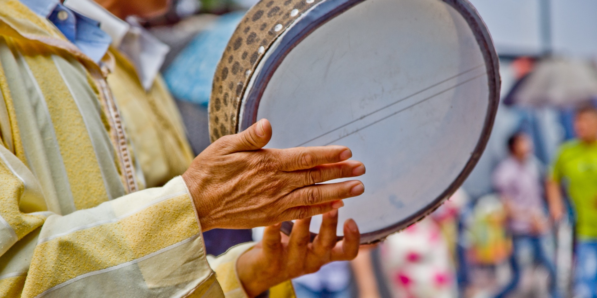 A musician playing a tambourine in Agadir, Morocco