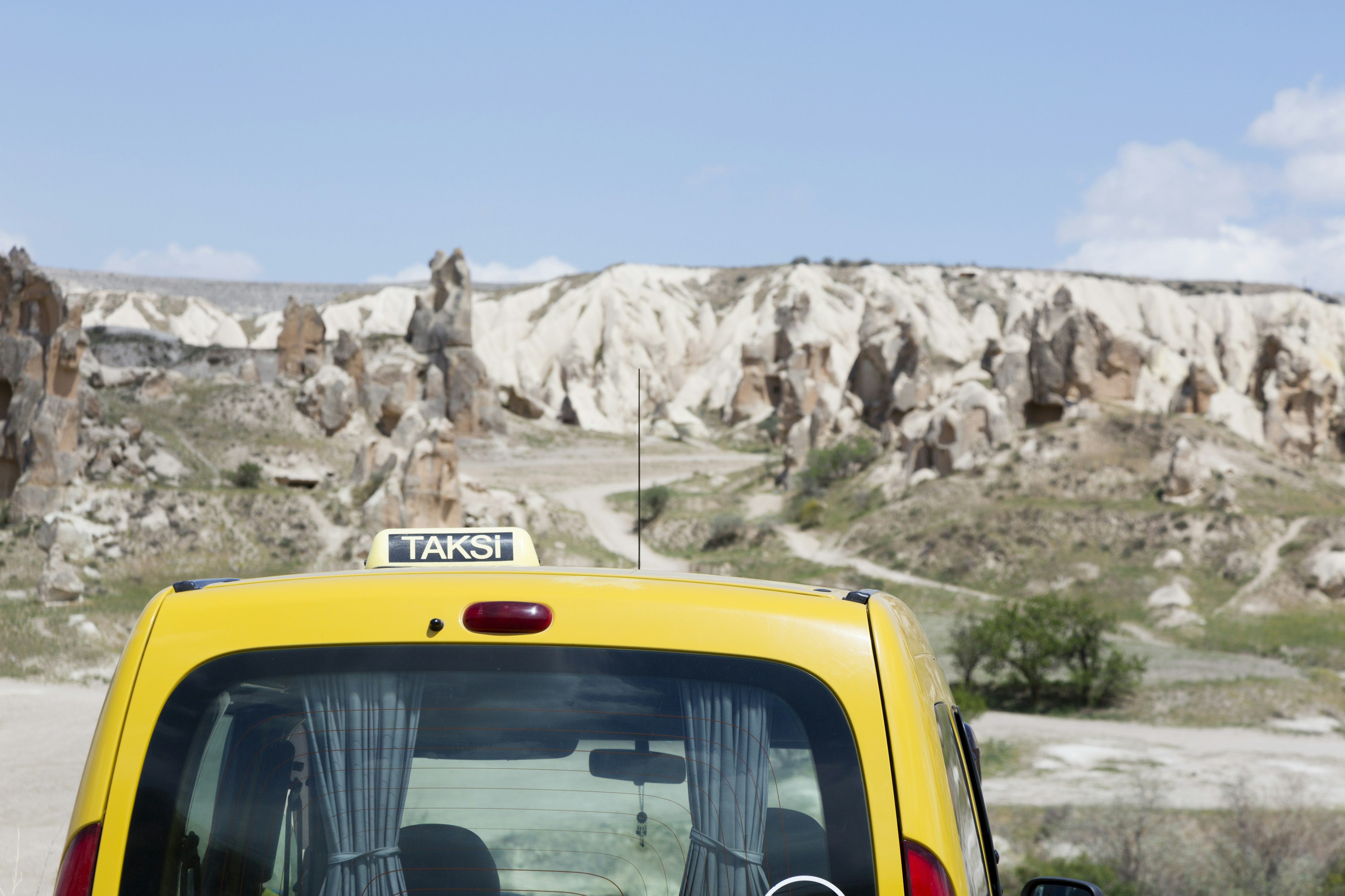 A taxi in Goreme looking out over the Cappadocia landscape