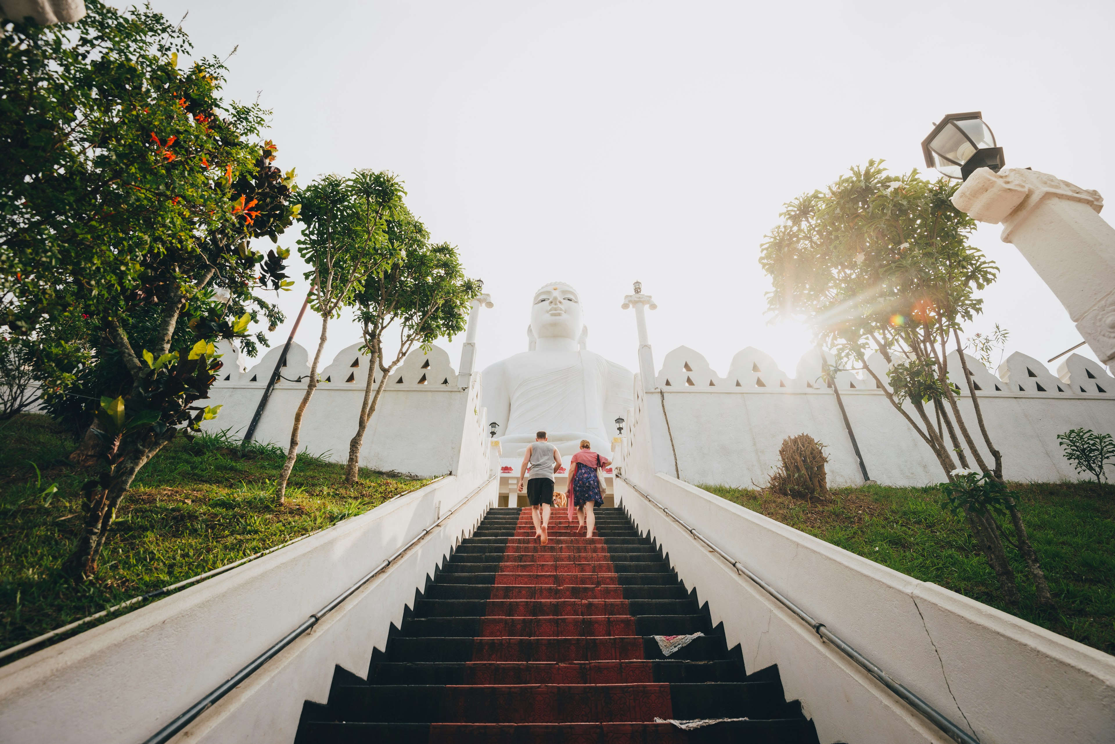 Tourists a the Bahiravokanda Viharaya Buddha temple in Kandy, Sri Lanka