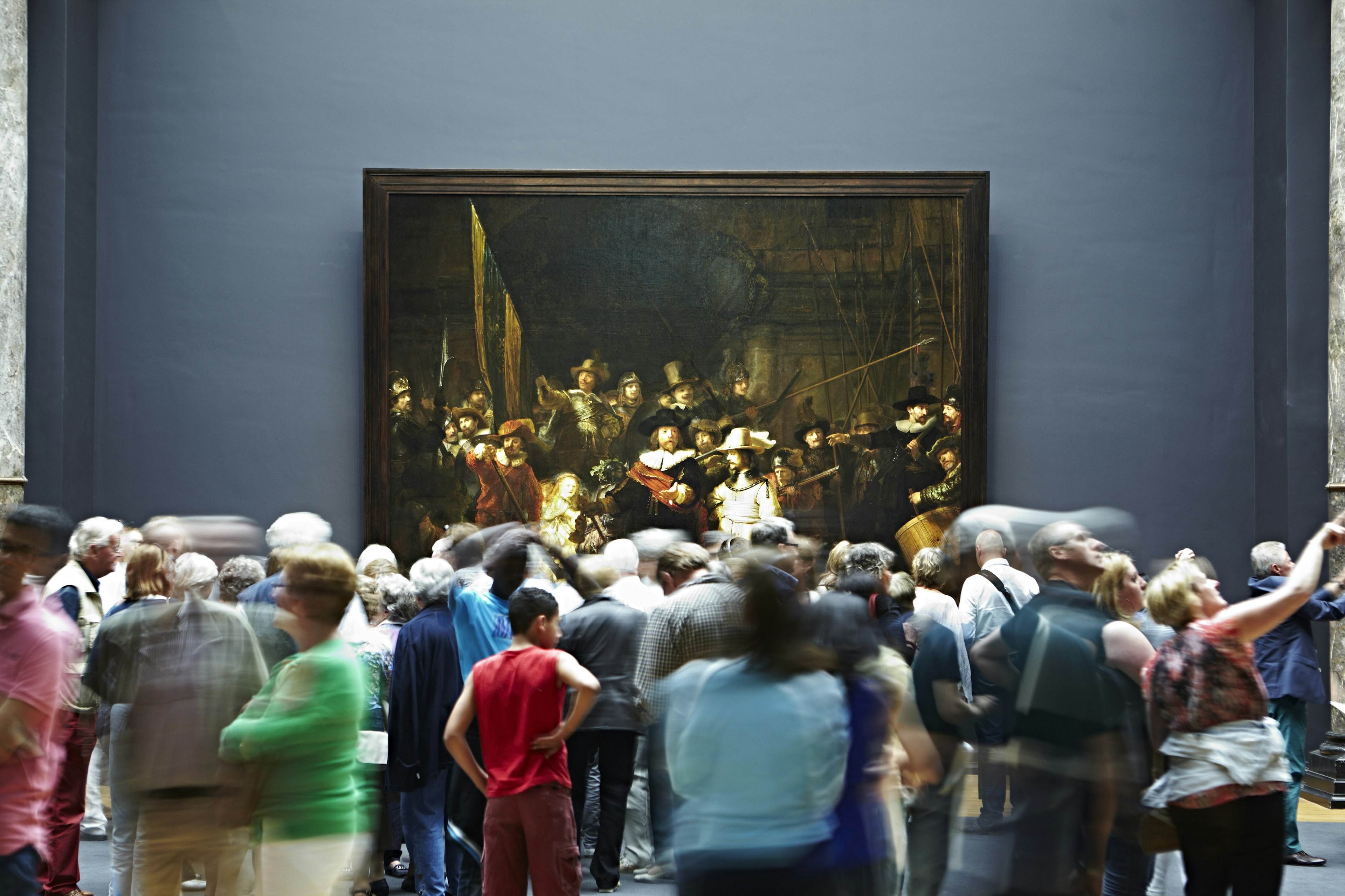 Crowd looking at Rembrandt’s 'The Night Watch' at the Rijksmuseum.