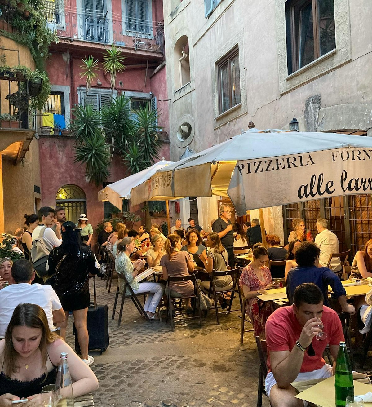 Pizzeria Alle Corrette Unassuming pizzeria drawing a local crowd for Roman-style pies, wine & desserts.