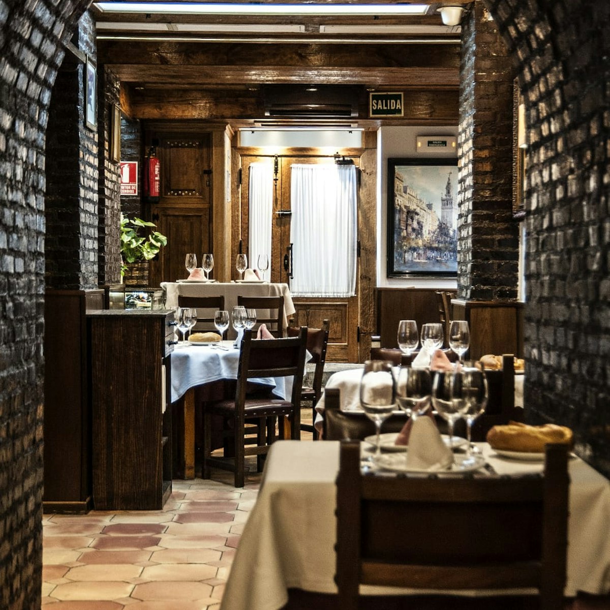 Casa Lucio in Madrid has rustic Spanish cuisine, including egg dishes & bull's tail stew, in a quaint spot opened in 1974.