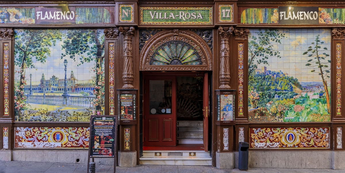 Details of an ornate retro mosaic facade of the restaurant called Villa Rosa famous for flamenco performance in Madrid, Spain