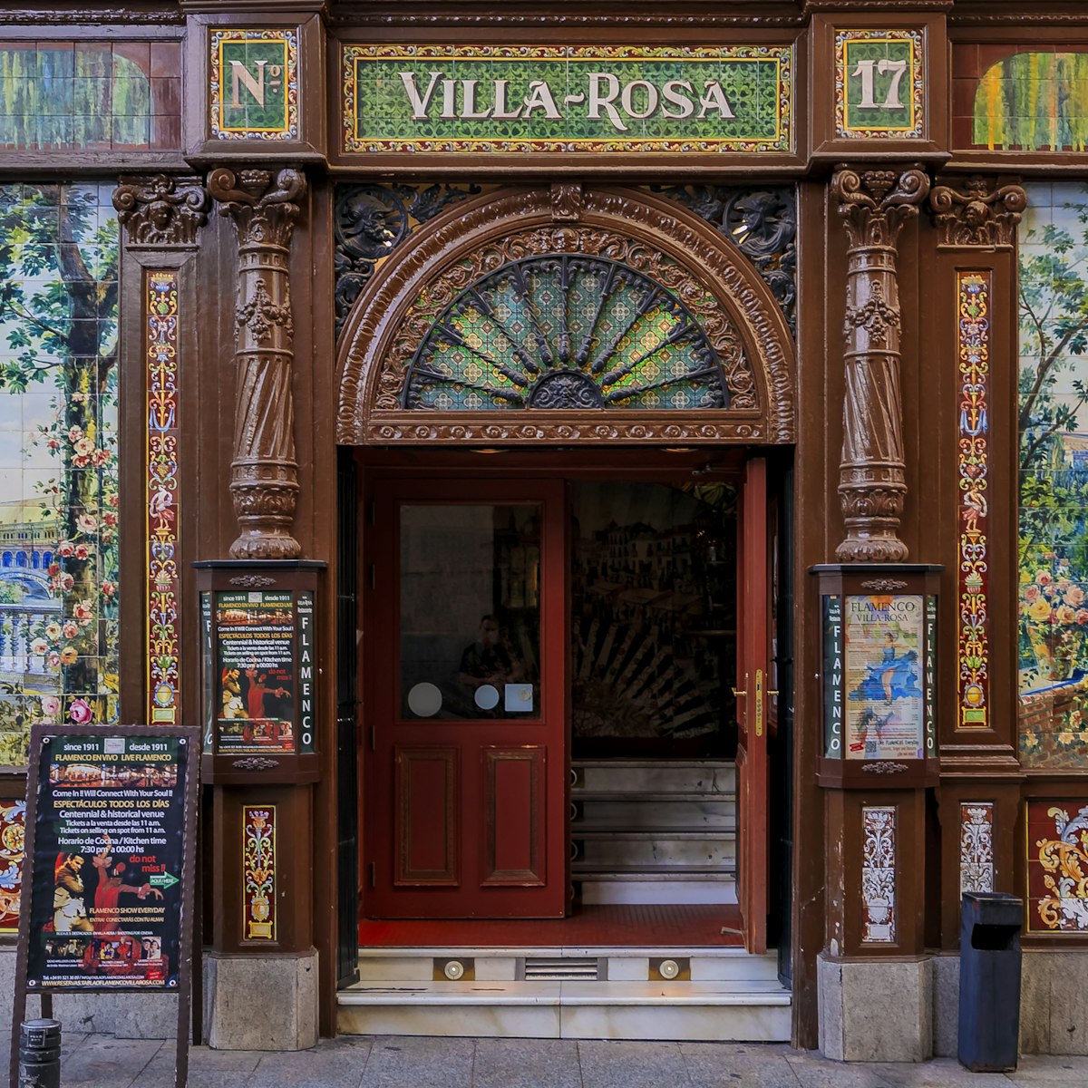 Details of an ornate retro mosaic facade of the restaurant called Villa Rosa famous for flamenco performance in Madrid, Spain