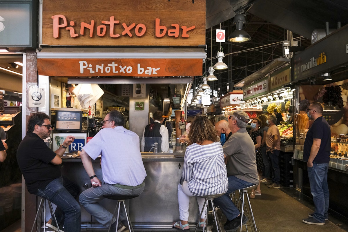 People enjoy their drinks in famous Pinotxo Bar in Barcelona, Spain on October 2, 2021.
1347216681
pinotxo
