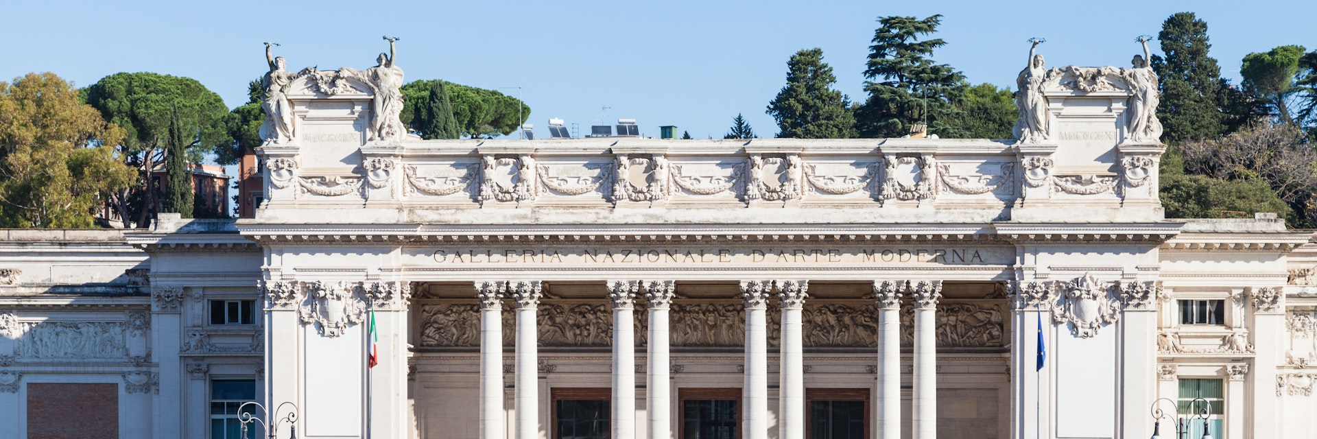 Rome, Italy - November 1, 2016: front view of Galleria Nazionale d'Arte Moderna (GNAM, National Gallery of Modern Art) art gallery, founded in 1883, in Villa Borghese public gardens in Rome city
629202620
Ornamental Garden, Travel, People Traveling, Villa Borghese, Building Exterior, City Life, Landscaped, Municipal Gallery Of Modern Art, Facade, Art, Art Museum, Modern, Italian Culture, Cultures, National Landmark, Architecture, Urban Scene, Outdoors, Front View, Tourist, People, Rome - Italy, Italy, House, Museum, Park - Man Made Space, Palace, Built Structure, Cityscape, Town, Gnam
Front view of National Gallery of Modern Art
