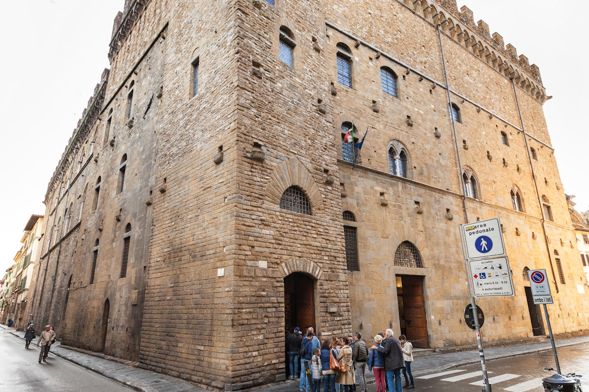 Tourists in line in Bargello palace in Florence.