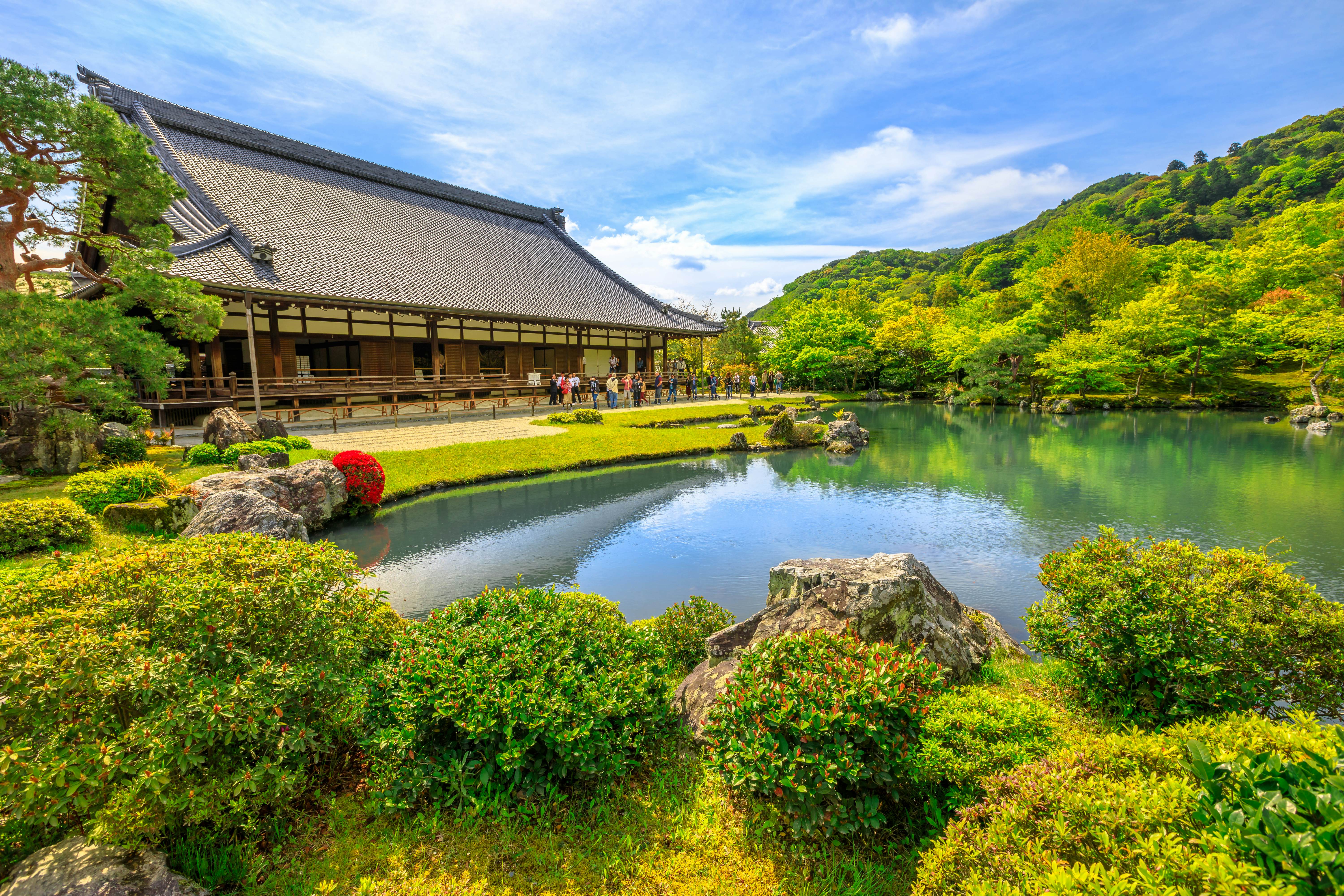 Kyoto, Japan - April 27, 2017: Hojo Hall and picturesque Sogen Garden or Sogenchi Teien with a circular promenade centered around Sogen-chi Pond in Tenryu-ji Zen Temple in Arashiyama. Springtime.
925512942