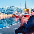 Kids brother and sister outdoors on winter day enjoying views of Tromso Norway; Shutterstock ID 1048818557; GL: 65050; netsuite: Online editorial; full: Norway Best Places to Visit; name: Tasmin Waby
1048818557