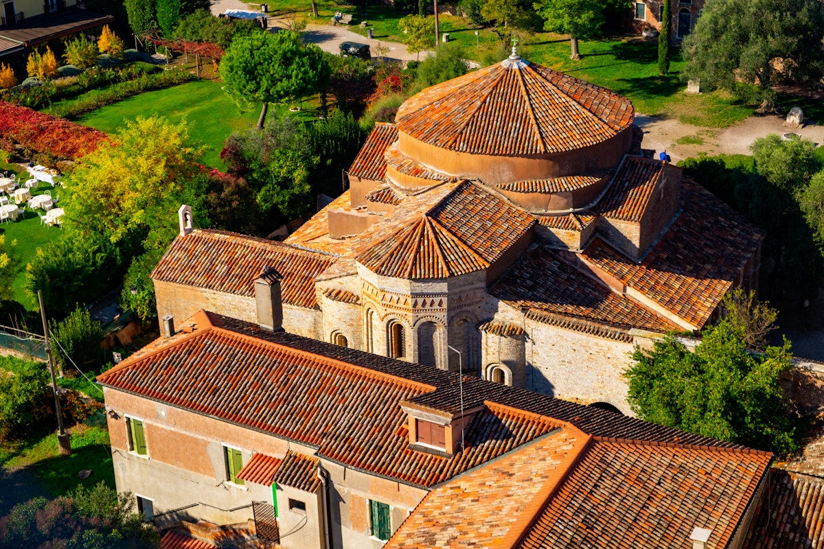 Aerial view of Santa Maria di Assunta cathedral on Torcello island in Venice lagoon, Italy