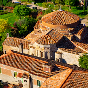 Aerial view of Santa Maria di Assunta cathedral on Torcello island in Venice lagoon, Italy