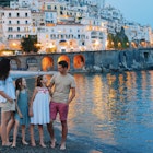 Family on vacation in Italy on Amalfi coast in evening light; Shutterstock ID 1451899376; GL: 65050; netsuite: Lonely Planet Online Editorial; full: Amalfi Coast with kids; name: Brian Healy
1451899376
alone, amalfi, ancient, architecture, beach, beautiful, buildings, campania, child, childhood, city, coast, coastal, colorful, day, enjoy, family, famous, girl, happy, historic, historical, holiday, houses, italian, italy, kid, landmark, landscape, little, mountain, nature, parents, picturesque, scenic, sea, seascape, seaside, sightseeing, street, summer, sunsetamalfi, tourism, touristic, town, travel, vacation, view, village