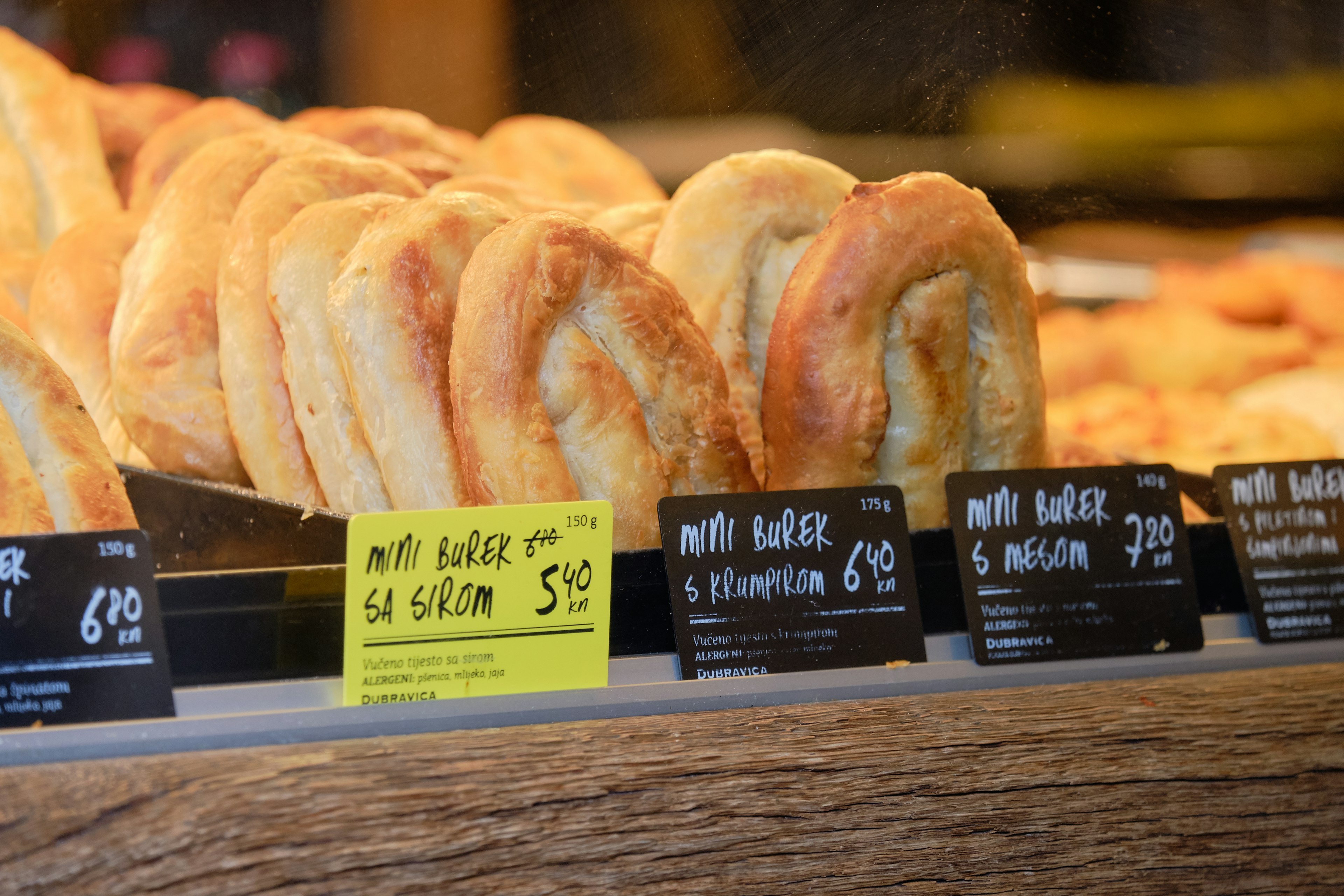 Shop display of mini burek at a bakery counter, Zagreb, Croatia