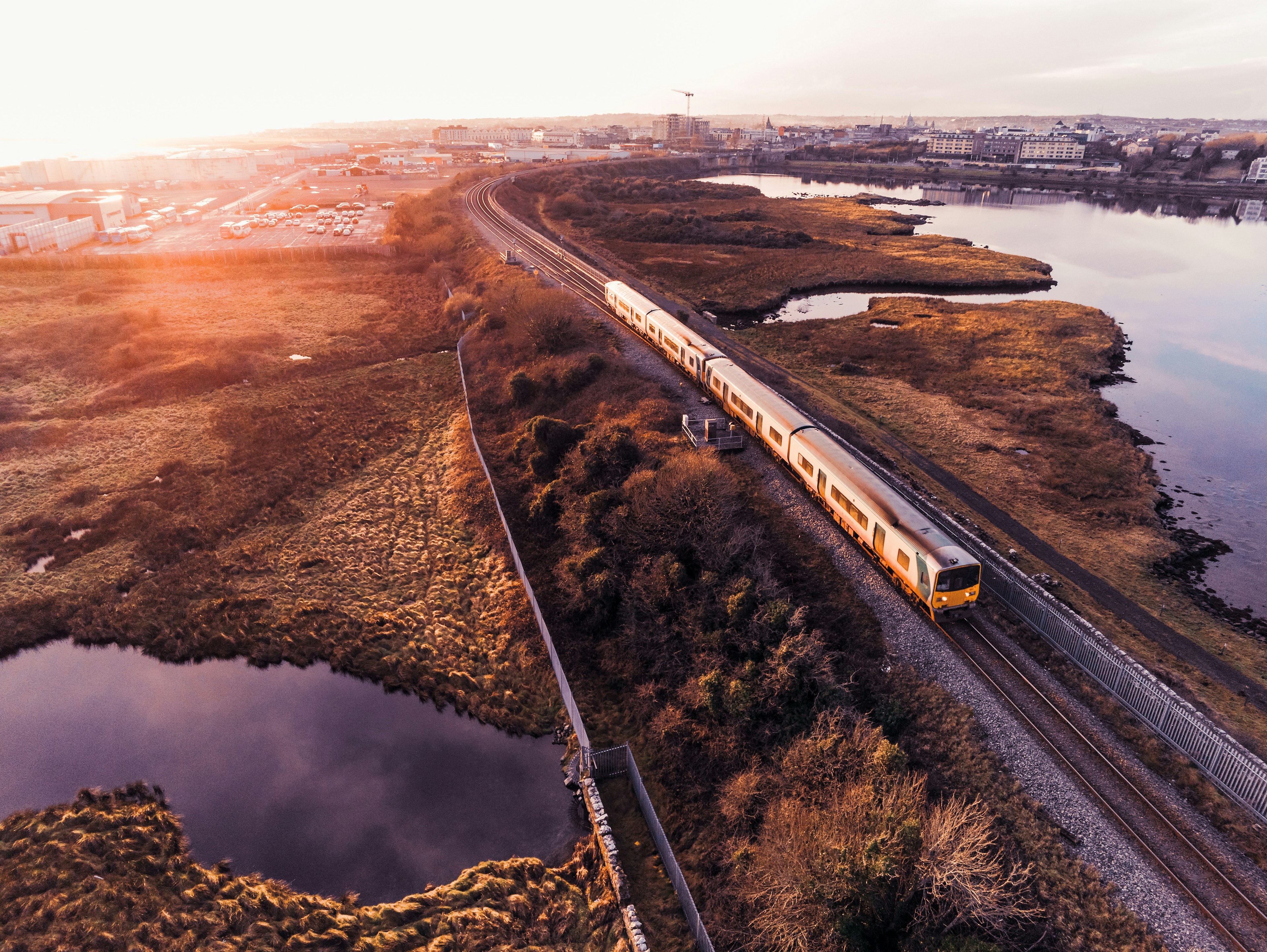 An aerial view of an Irish Rail train at sunset, Galway, Ireland