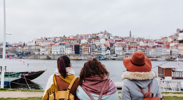 back view of three women sightseeing Porto views by the river. Travel and friendship concept; Shutterstock ID 1942684885; GL: 65050; netsuite: Online editorial; full: Porto neighborhoods; name: Claire Naylor
1942684885
