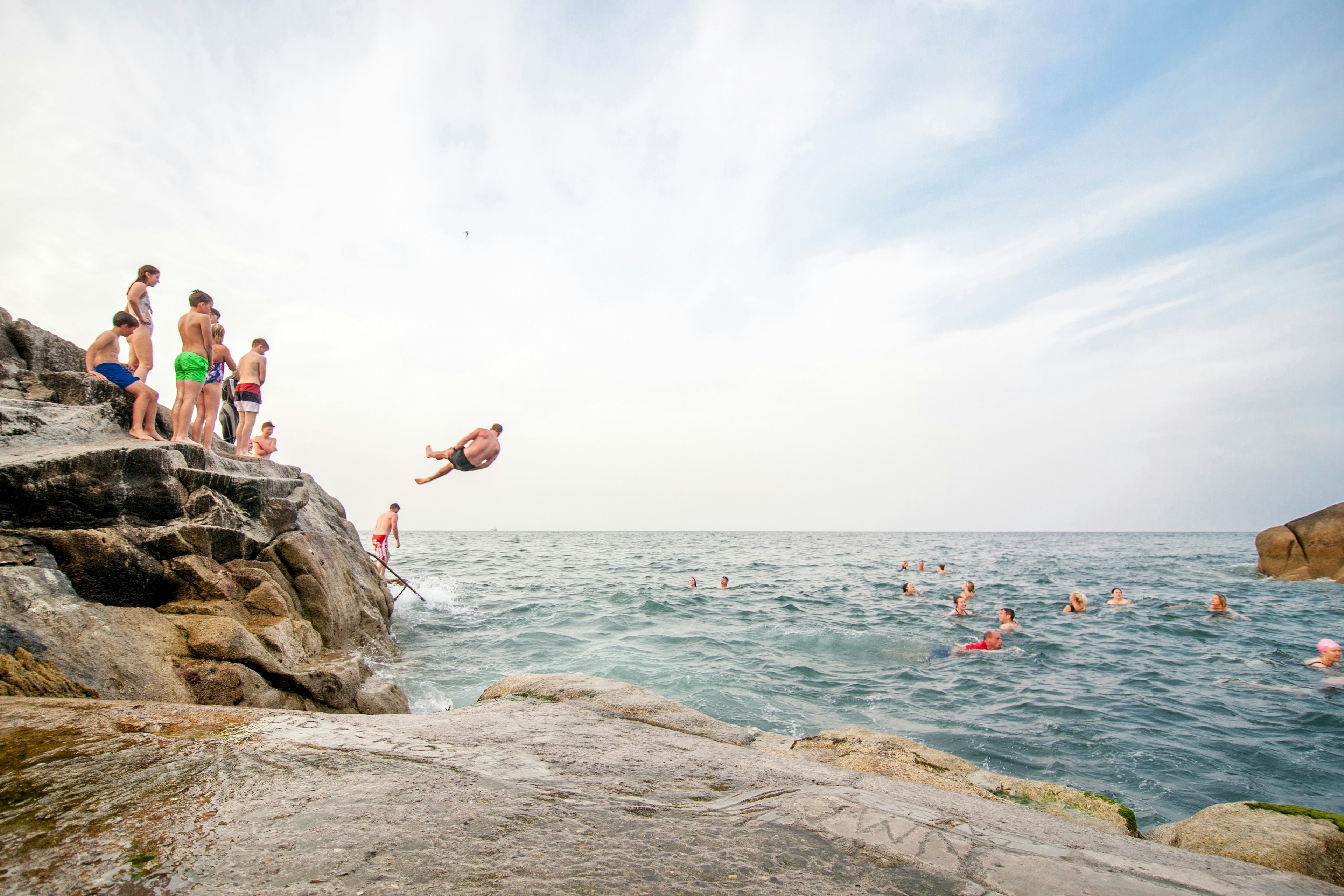 People diving into the sea at the Forty Foot, Dún Laoghaire, County Dublin, Ireland