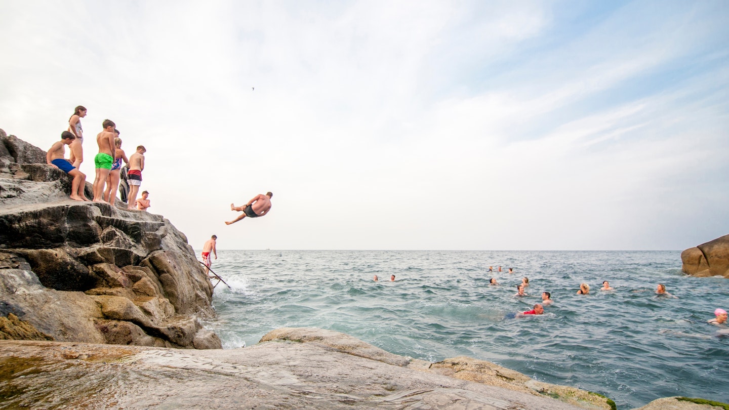Dublin - Forty Foot - 08.14.2020 - People diving at the Forty Foot ; Shutterstock ID 2070080024; GL: 65050; netsuite: Online ed; full: Ocean pools; name: Claire Naylor
2070080024