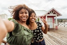 Young women at Tourist Pier of La Ceiba, Happy friends tourists visiting Honduras famous landmark.; Shutterstock ID 2125965536; GL: 65050; netsuite: Online Editorial; full: Things to know Honduras; name: Bailey Freeman
2125965536