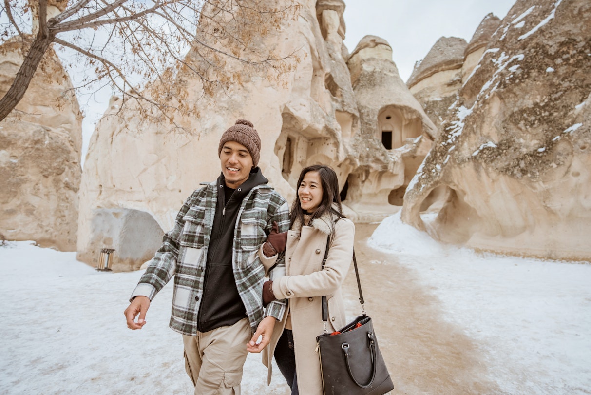 young asian tourist couple walking in pasabagi valley and cave in cappadocia goreme turkey; Shutterstock ID 2192189409; GL: 65050; netsuite: Online ed; full: Cappadocia budget; name: Claire N
2192189409