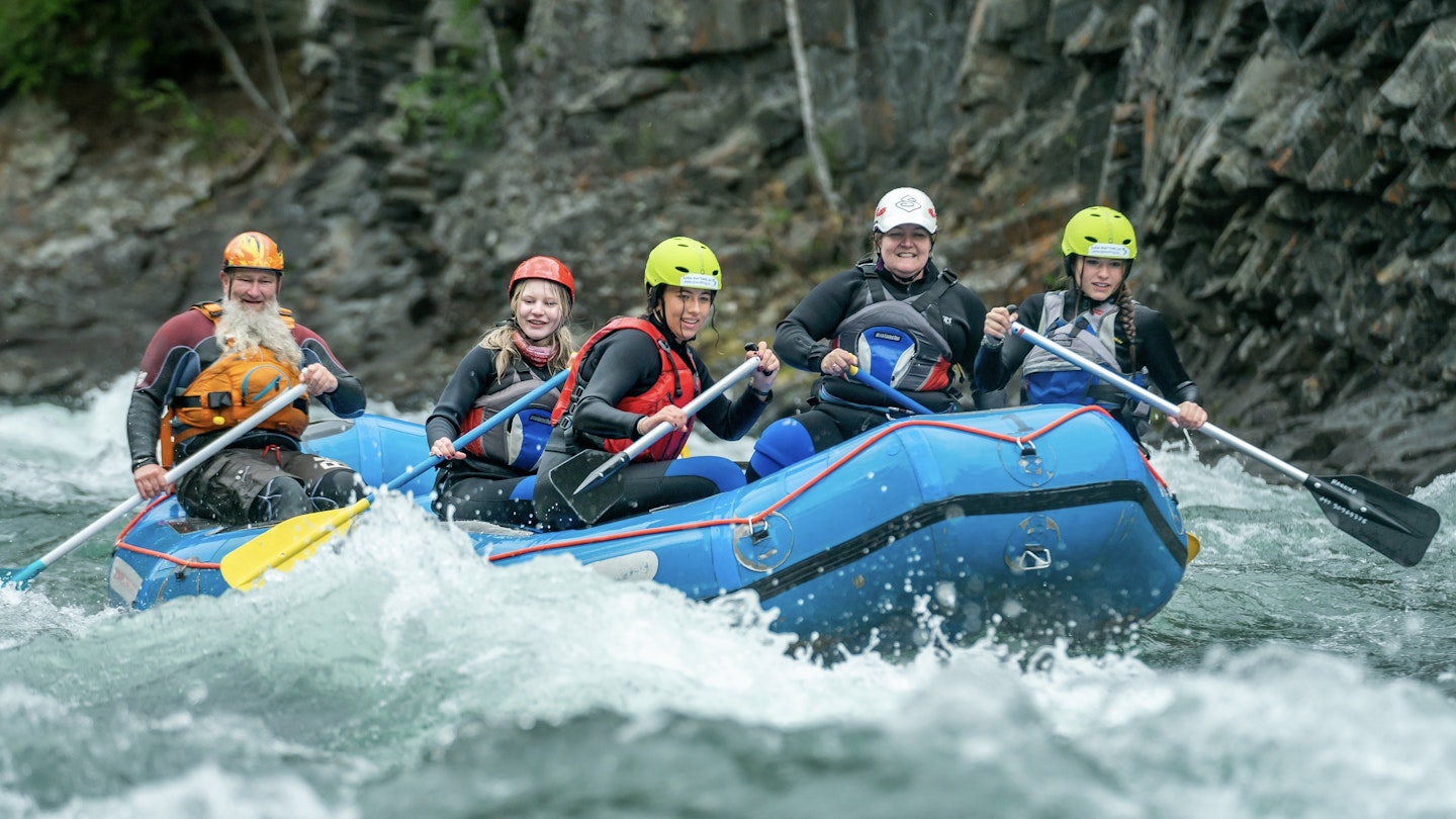 SJOA, NORWAY - JULY 12, 2022: Rafting down famous rapids on Sjoa river in central Norway during annual Sjoa river festival; Shutterstock ID 2194237091; GL: 65050; netsuite: Lonely Planet Online Editorial; full: Norway with kids; name: Brian Healy 2194237091 activity, adrenaline, athletes, boat, boats, canoe, clean, cold, community, competitions, event, extreme, festival, free, fun, gudbransdal, heidal, kayaking, life jacket, lifestyle, mountain, nature, norway, outdoor, paddle, people, pure, raft, rafting, recreation, river, sjoa, sjoa river festival, splash, summer, swimsuits, teamwork, trip, vacation, water, water sport, waves, whitewater