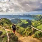 View of Sete Cidades near Miradouro da Grota do Inferno viewpoint, Sao Miguel Island, Azores, Portugal. ; Shutterstock ID 2311721619; GL: 65050; netsuite: Lonely Planet Online Editorial; full: First-timer's guide to the Azores; name: Brian Healy
2311721619
adventure, azores, background, blue, cidades, cloud, crater, delgada, europe, field, forest, green, hike, hiking, hill, island, lagoon, lake, landscape, miguel, mountain, nature, ocean, outdoor, park, path, peak, ponta, ponta delgada, portugal, sao, sao miguel, scenic, sete, sete cidades, sky, so miguel azores, summer, tourism, trail, travel, trek, trekking, valley, view, viewpoint, volcanic, volcano