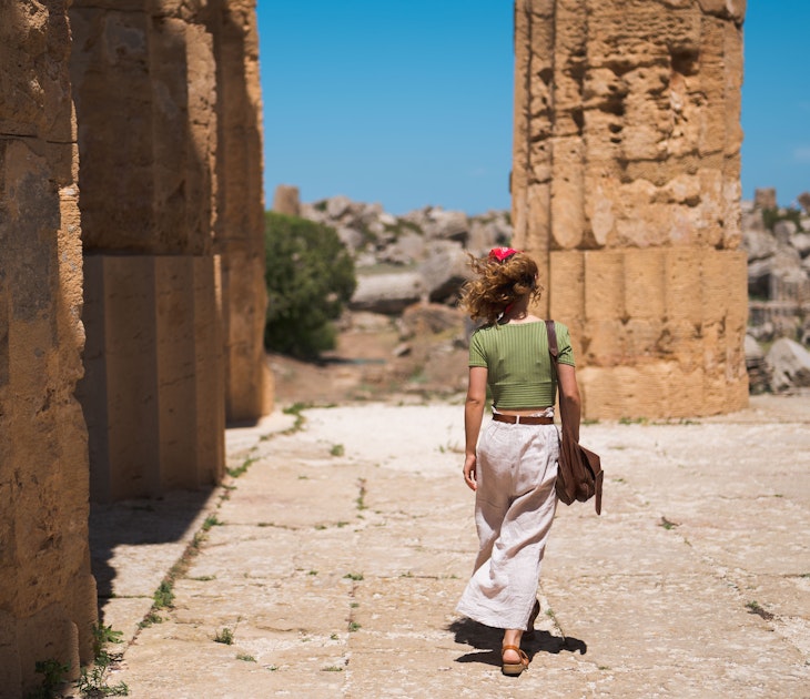 Captivating Journey: Young Girl with Bandana Exploring Ancient Greek Temples of Selinunte in Sicily among the prickly pears; Shutterstock ID 2347873817; GL: 65050; netsuite: Online Editorial; full: Best things to do in Sicily ; name: Bailey Freeman
2347873817
