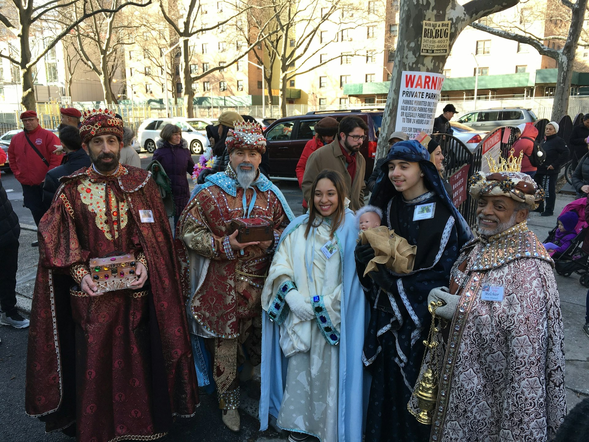 People dressed up in costumes at the Three Kings Day parade in East Harlem, New York City, New York, USA