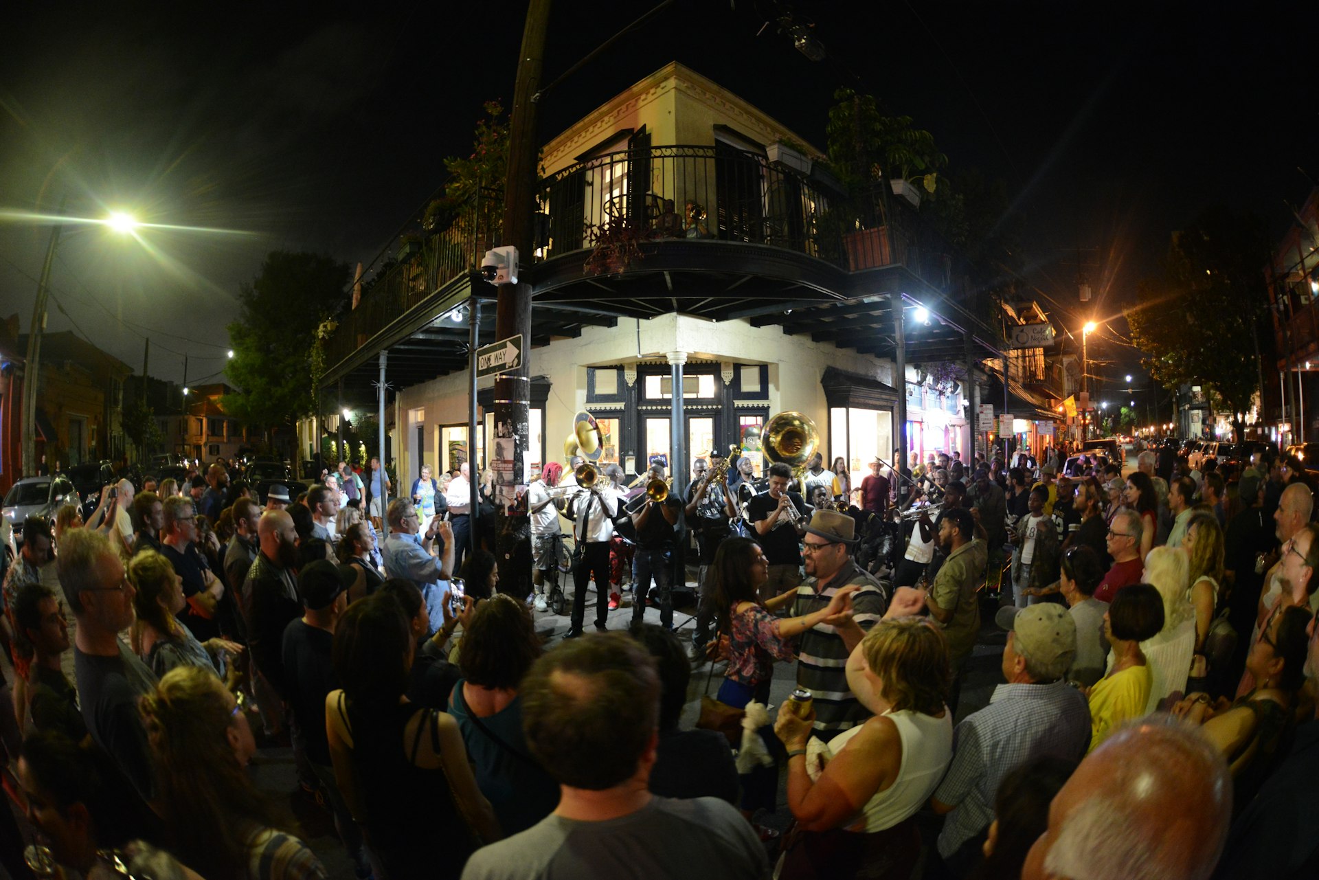 A local brass band plays on a street corner at Frenchmen Street, New Orleans, Louisiana, USA