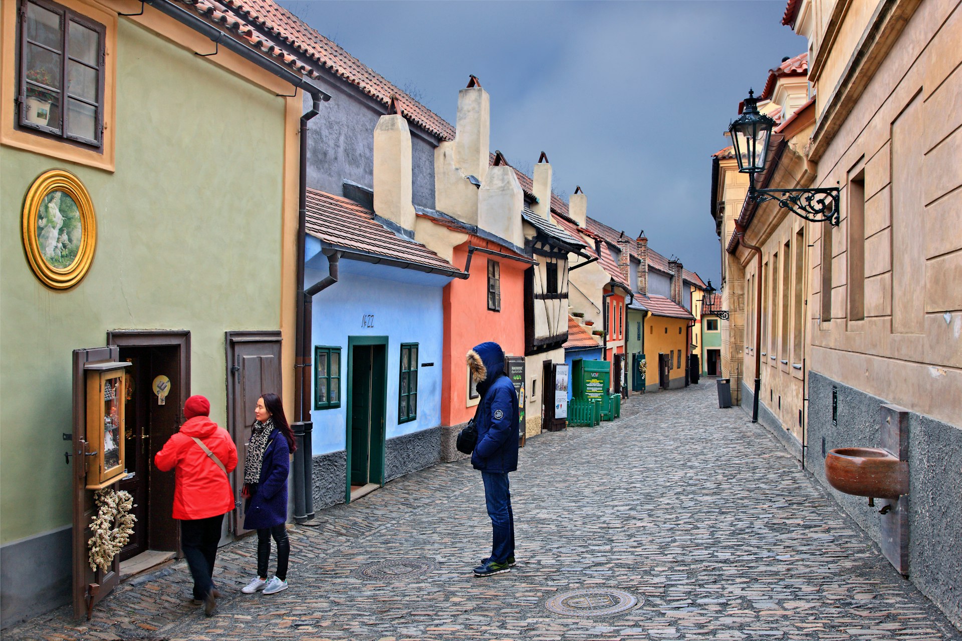 Tourists look at the historic houses along Golden Lane, Prague Castle, Prague, Czech Republic