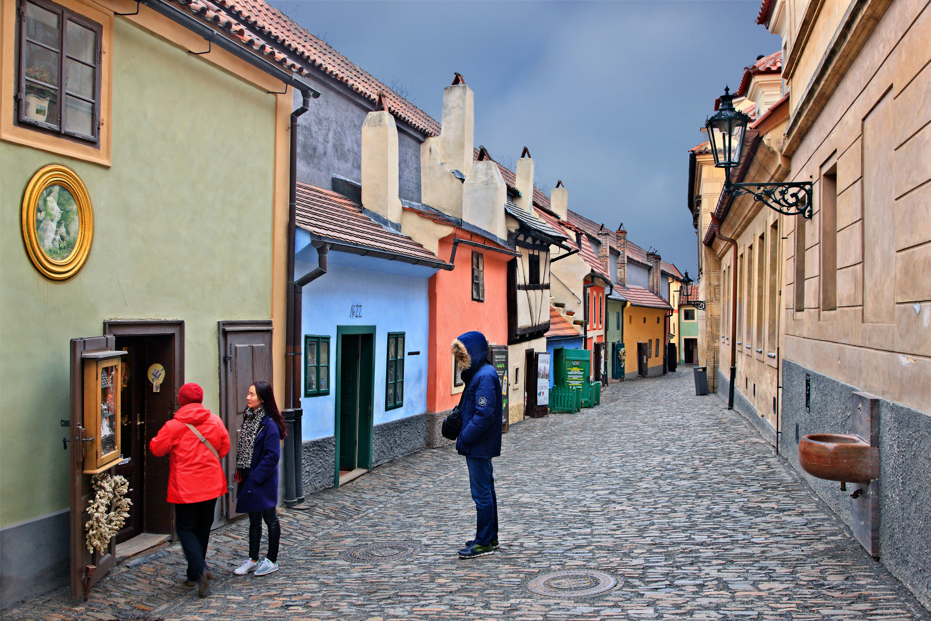 Tourists look at the historic houses along Golden Lane, Prague Castle, Prague, Czech Republic