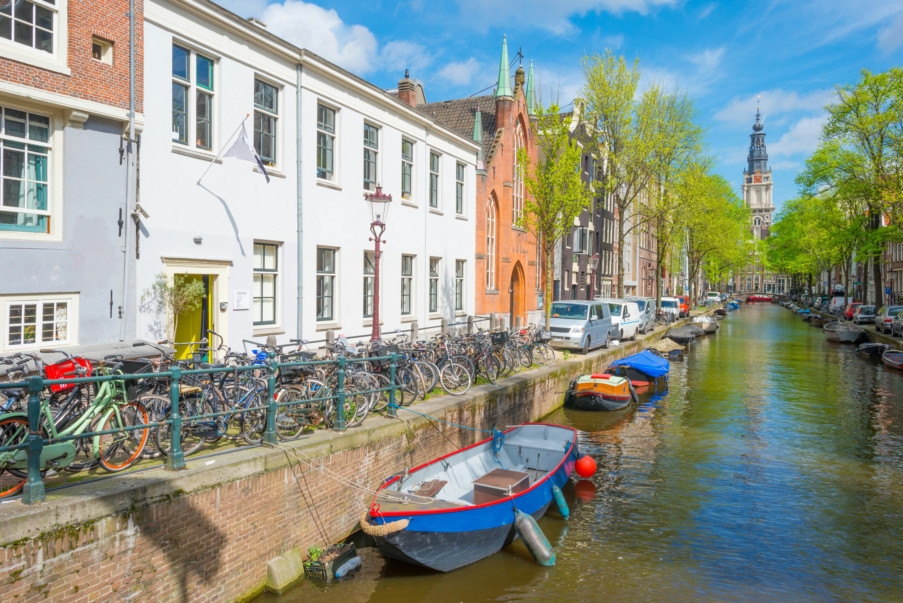 Canal in the city of Amsterdam with boats moored