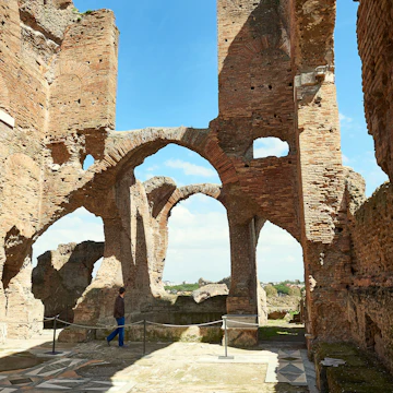 Ruins of Villa dei Quintili on the Appian Way in Rome.
1119245861
ancient, antique, antiquity, appia, archaeological area, archeology, arches, architecture, art, blue, blue sky, bricks wall, building, city, cloudy blue sky, cloudy sky, culture, europe, famous, historic, historical, history, italy, landmark, landscape, location, man, mediterranean, monument, monumental, mosaic, mosaic tiles, old, outdoor, panoramic, proportions, roman empire, rome, ruins, site, stone, structure, tourism, tourist, travel, villa dei quintili, visited, vía apia, wall, wall texture, villa dei quintili