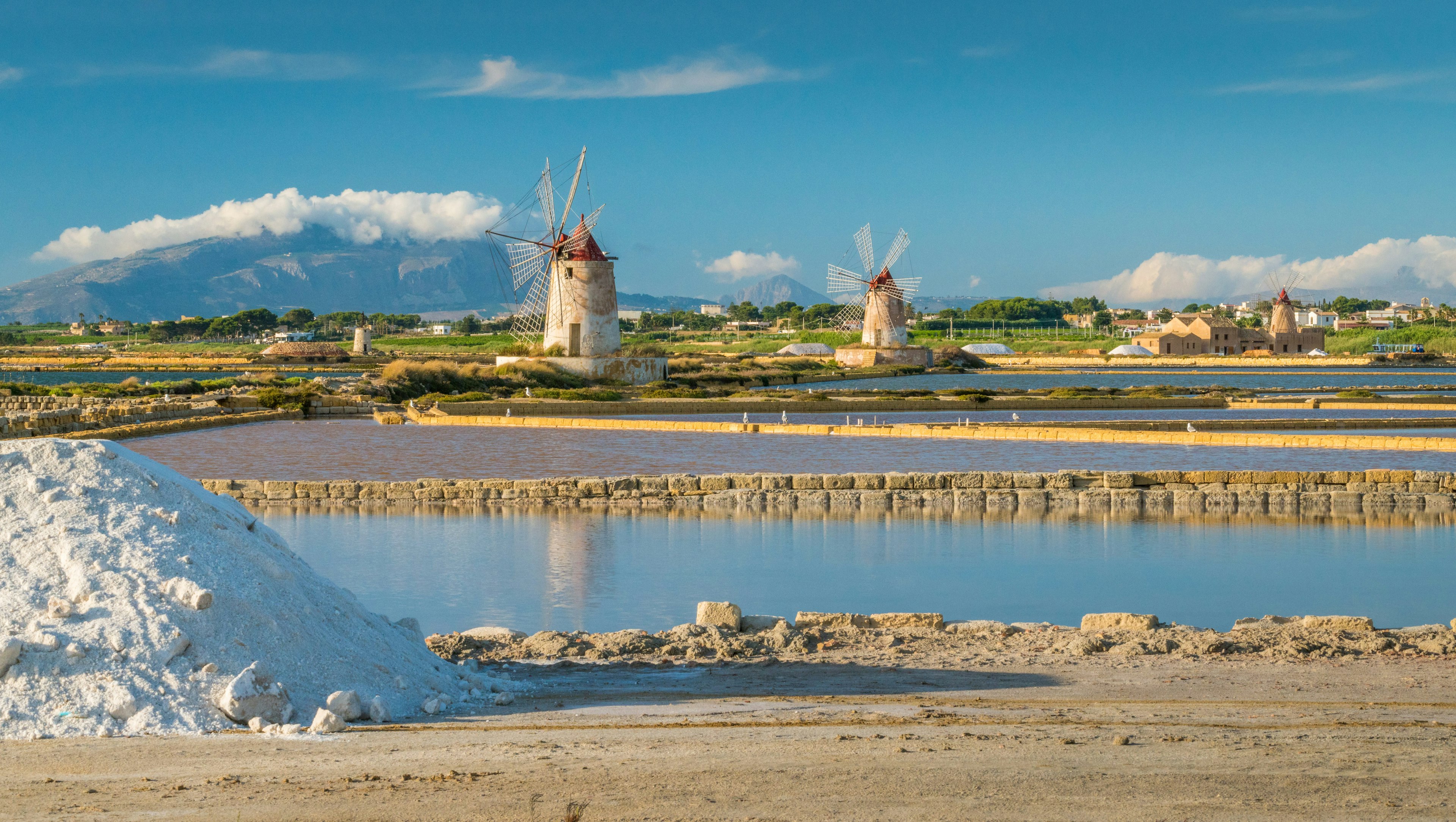 Salt flats with two windmills