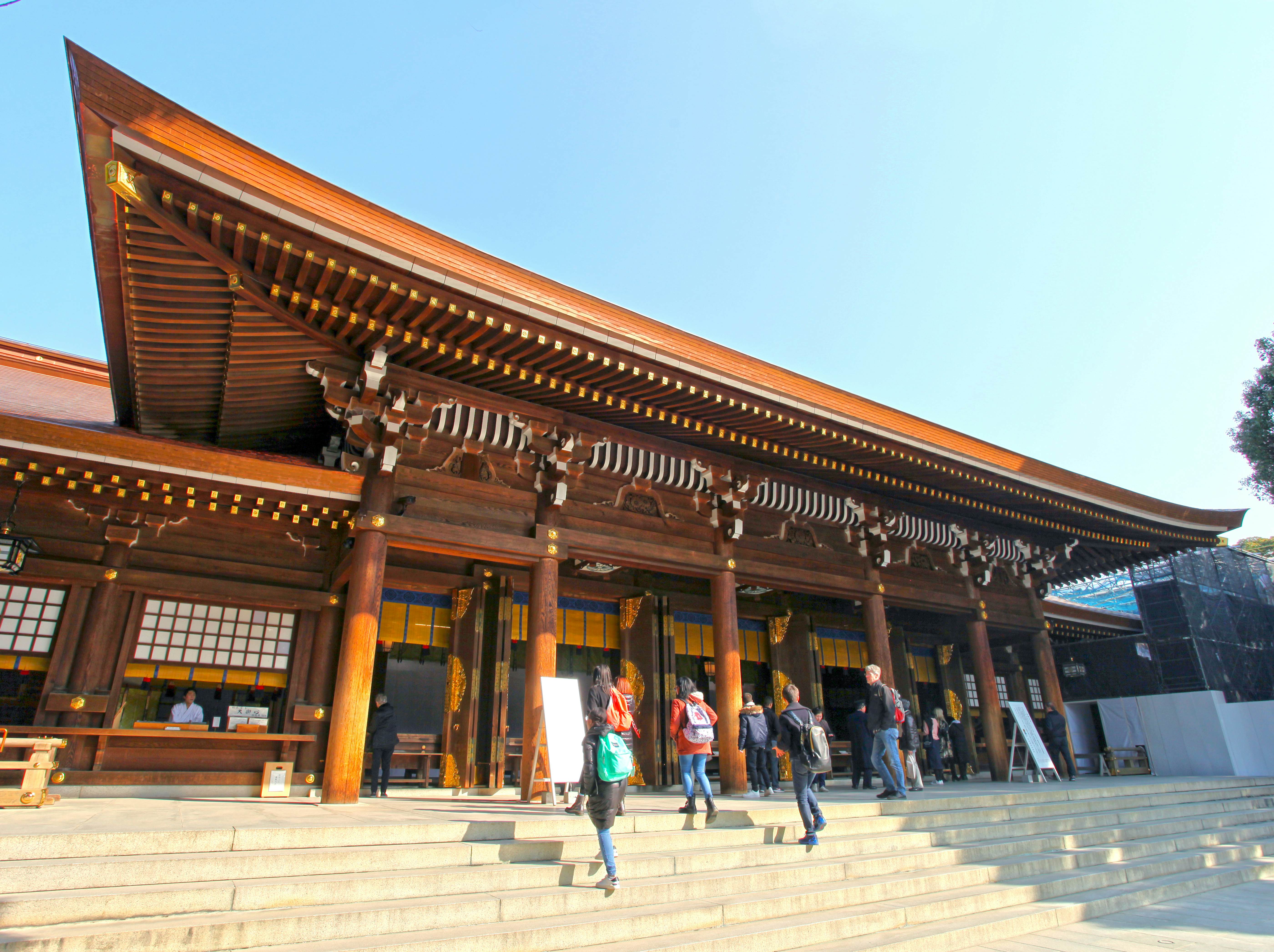 February 27, 2018: Exterior of the Meiji Jingu Shrine in Shibuya.
1244659003
architecture, asia, asian, blue sky background, building, culture, famous, historical building, historical place, historical temple, japan, japanese shrines, japanese temples, landmark, meiji jingu shrine, meiji shrine, old, people, religion, religions, religious, shibuya district, shinto religion, shinto shrines, sunny day background, temple building, tokyo shrines, tokyo temples, tourism, tourist destination, tourists, traditional, travel, trees, visiting tokyo, visitors, wooden buildings, wooden shrine, wooden table