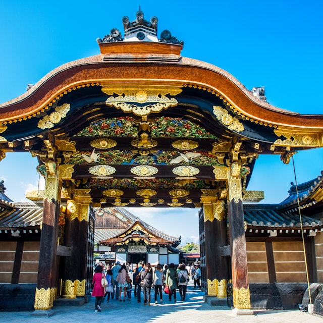 KYOTO, JAPAN - March 27, 2014: The Nijo-jo Castle on March 27, 2014 in Kyoto, Japan. The Nijo-jo Castle was the residence of the Tokugawa shoguns in Kyoto, who had been ruling Japan for over 260 years
ancient, asia, asian, blue, building, castle, concentric, cultivated, culture, day, defense, entrance, fortification, garden, heritage, higashi, historic, historical, history, honmaru, japan, japanese, keep, kyoto, landmark, landscape, nijo, nijo-jo, ninomaru, old, oriental, palace, path, precision, protection, structure, tradition, traditional, travel, tree, vintage, wooden