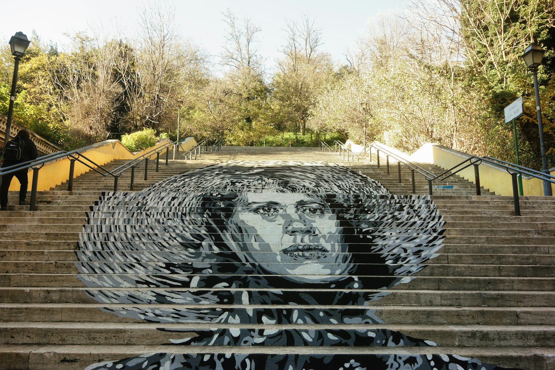 The work of the Italian street artist David Diava Vecchiato on the stairs in via Ugo Bassi