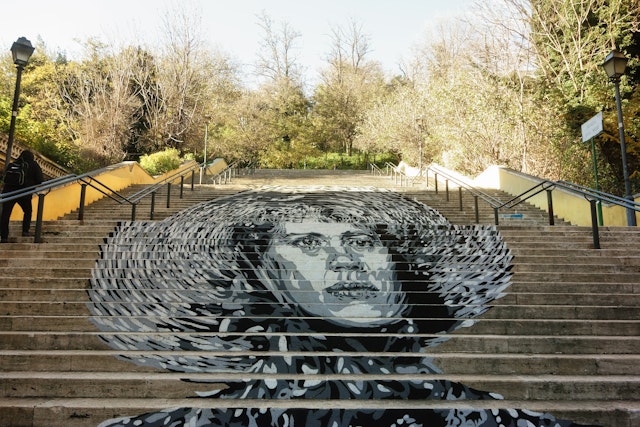 The work of the Italian street artist David Diava Vecchiato on the stairs in via Ugo Bassi