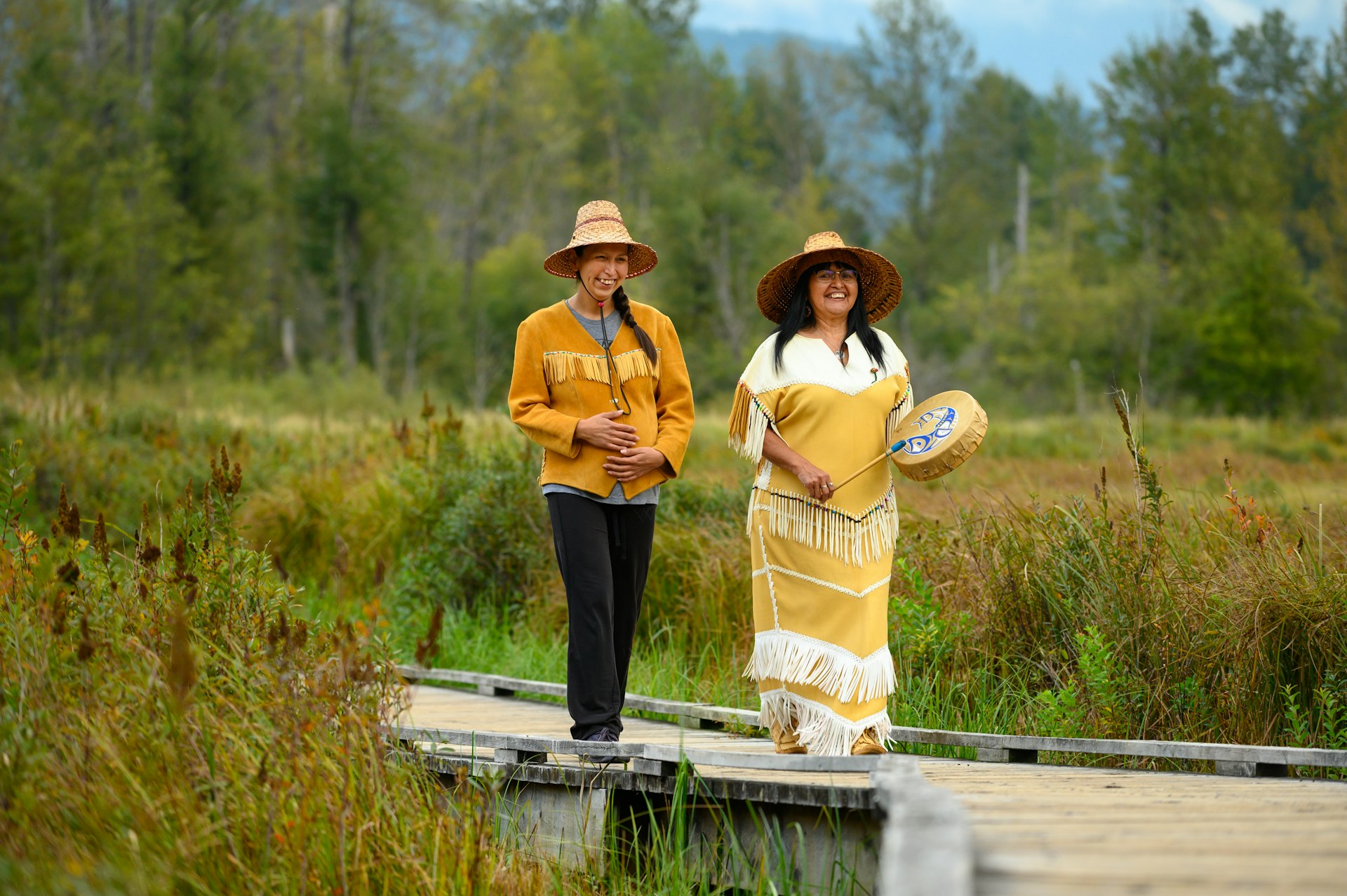 Two female First Nations people dressed in traditional clothing, Canada