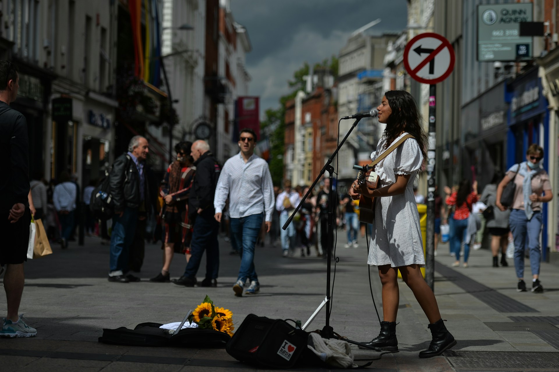 Musician and singer Emmeline Gracie performing on Grafton St in Dublin, Ireland