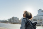 1277160380
20-30 years, adults, casual, dublin, female tourist, glasses, holiday, leisure, millennials, province leinster, sunshine, urban, urban scene, woman, young adults
Young woman with backpack standing against clear sky in city during sunny day - stock photo
1277160380