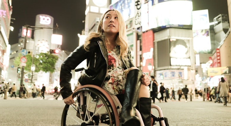 Cool Asian woman has a wheelchair enjoy the night life in Shibuya, Tokyo
1315362540