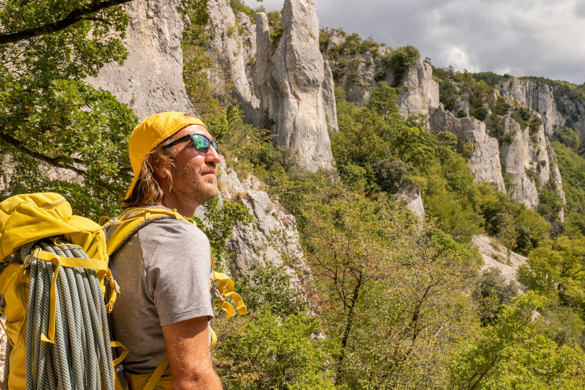 A man hiking through a canyon in Istria, Croatia.