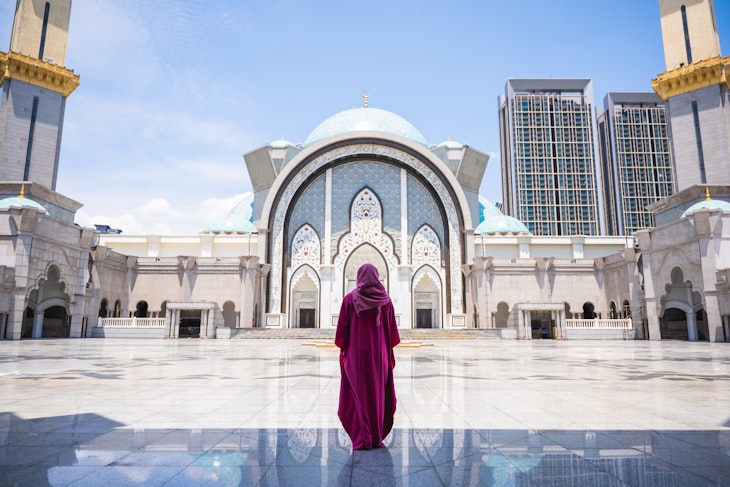 Rear view of Muslim female prayer standing in Federal Territory Mosque or Masjid Wilayah Persekutuan in Kuala Lumpur
1472891567
