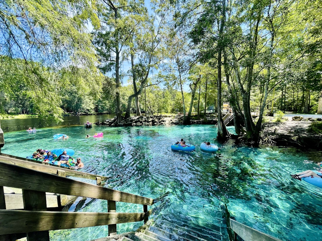 Tubers and swimmers float in the shallow clear aqua spring waters near Devil's Eye in the Devil's Run spring, Ginnie Springs, Florida
1498981596
