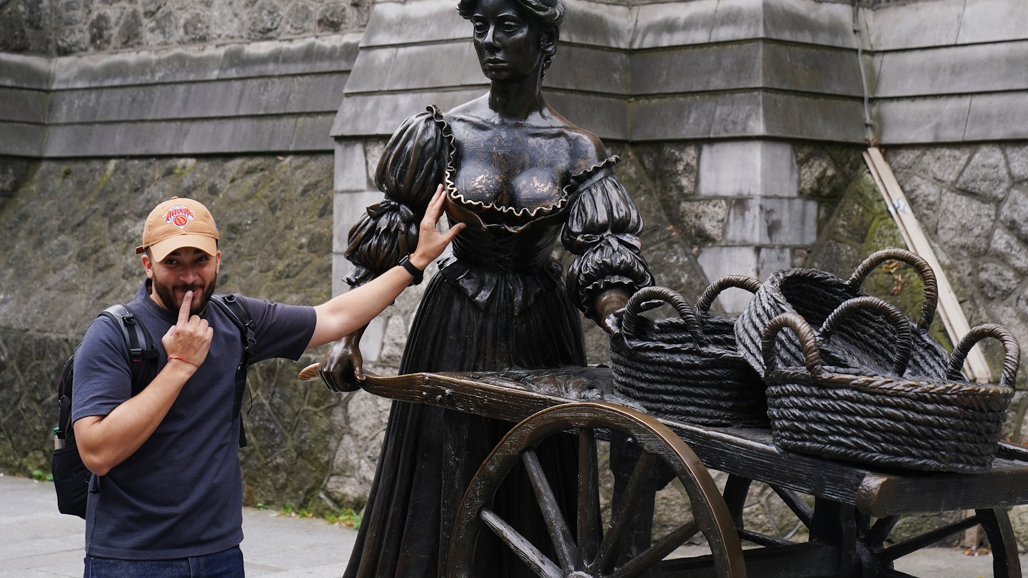 A person poses for a photograph with the iconic Molly Malone statue in Dublin's city centre after it was vandalised with black paint across it's front. The statue of the semi historical, semi-legendary figure is a popular tourist destination. Picture date: Wednesday August 16, 2023. (Photo by Brian Lawless/PA Images via Getty Images)
1602353319