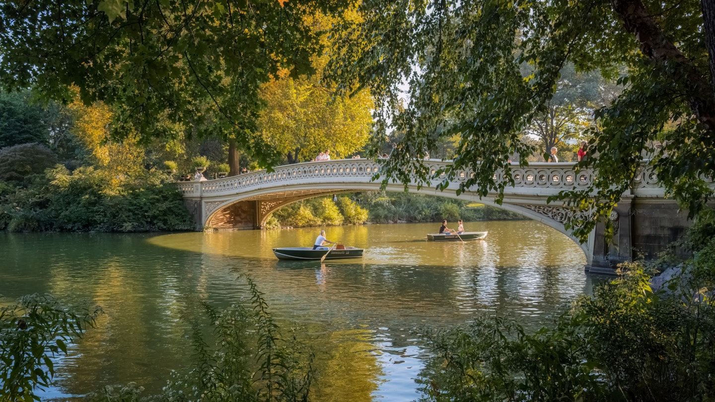 New York City - October 4, 2023:P eople rowing rowboats row under the Bow Bridge in Central Park, Manhattan. Bow Bridge gets its name from its graceful arc shape which is similar to an archer's bow. It is the oldest cast-iron bridge in Central Park. The Bow Bridge was designed by Calvert Vaux and Jacob Wrey Mould.
1727929871