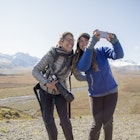 senior mom and adult daughter on adventure journey together in Alaska taking a self portrait with smartphone
520818569
memories, togetherness, bonding, technology, adventure