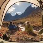 Two campers sit outside their tent admiring the view of the Brooks mountains in Alaska
523410044
Getty,  RFC,  men:CB2,  women:CB2,  landscape:CB2,  tent:CB2,  couples:CB3,  outdoors:CB2,  middle-aged:CB2,  mountain:CB2,  campsite:CB2,  scenic:CB2,  Arrigetch Peaks:CB2,  Gates of the Arctic National Park:CB2,  arial peak:CB2,  arrigetch creek:CB2,  natural world:CB2,  two people:CB2,  wilderness area:CB2,  Adult,  Camping,  Female,  Hat,  Male,  Man,  Mountain Tent,  Nature,  Outdoors,  Person,  Shelter,  Tent,  Woman